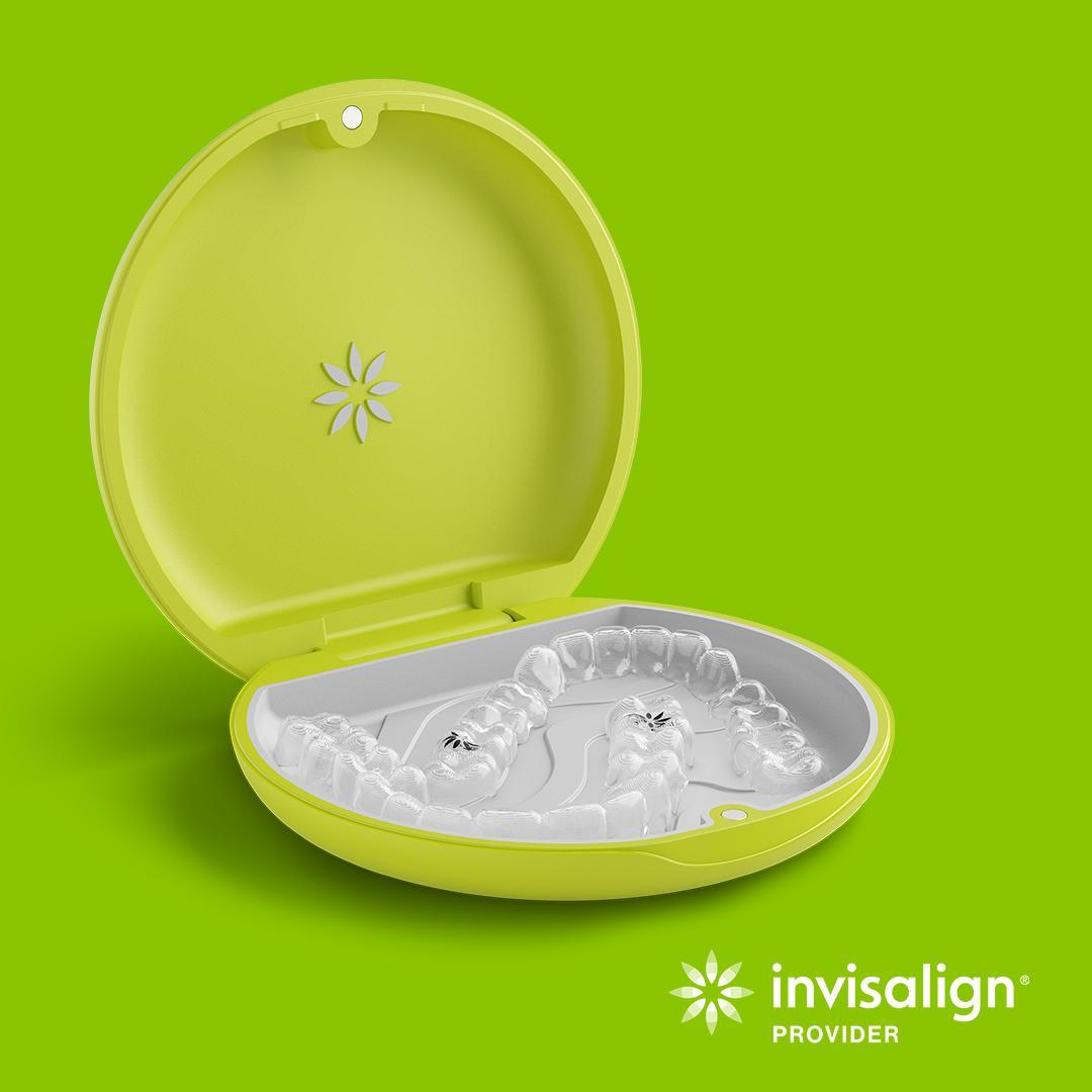 Invisalign aligners sitting in their case