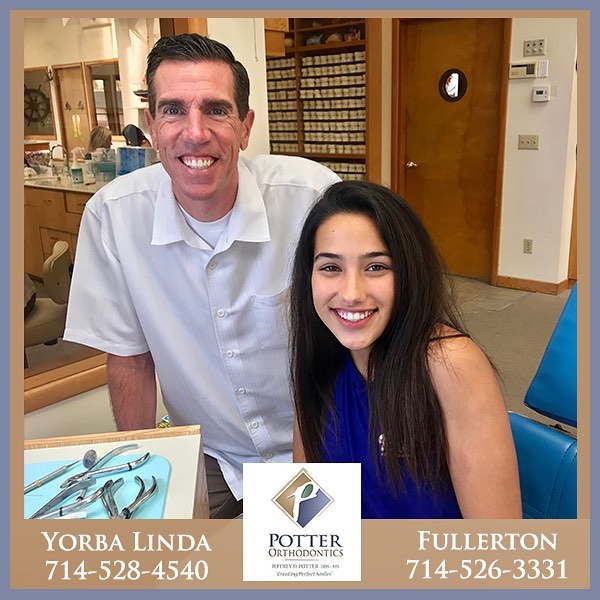 Dr. Potter and a young woman smiling